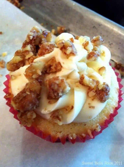 pecan pie cupcake with buttercream frosting and candied pecans