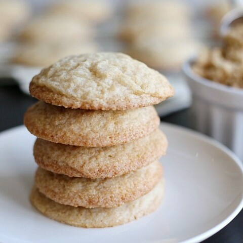 brown sugar cookies stacked on a plate