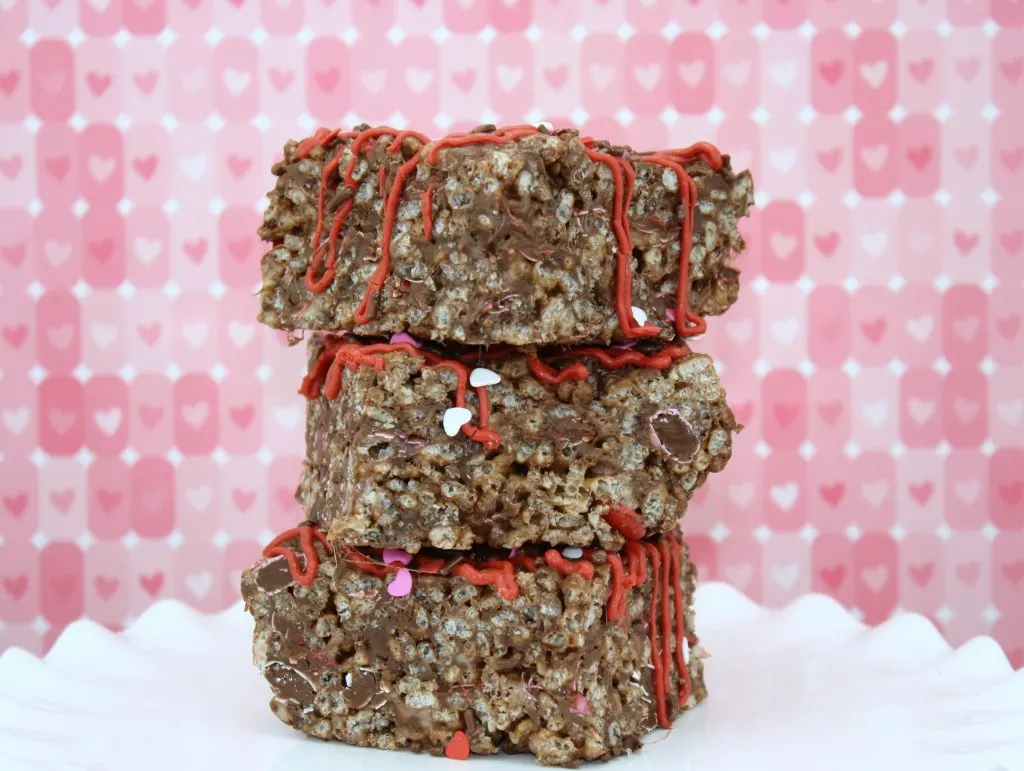 Stack of three cocoa rice krispie treats. 