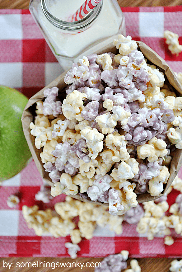 top view of PB&J sweet popcorn in a brown paper bag 