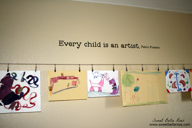 Great way to display kids art in a playroom