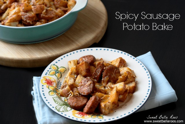 serving of sausage and potato bake on a white floral plate. 