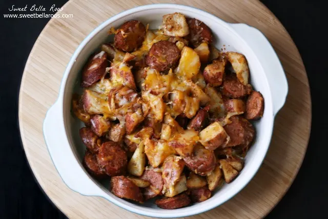 overhead view of sausage and potato bake in a white baking dish. 