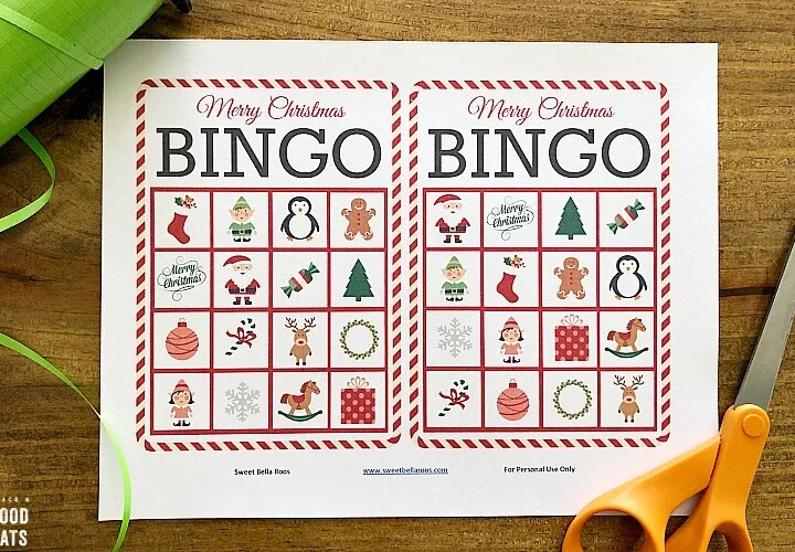 Christmas bingo printable on a table with scissors and ribbon