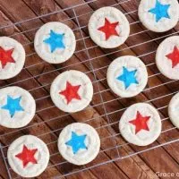 sugar cookies with sprinkles on a cooling rack