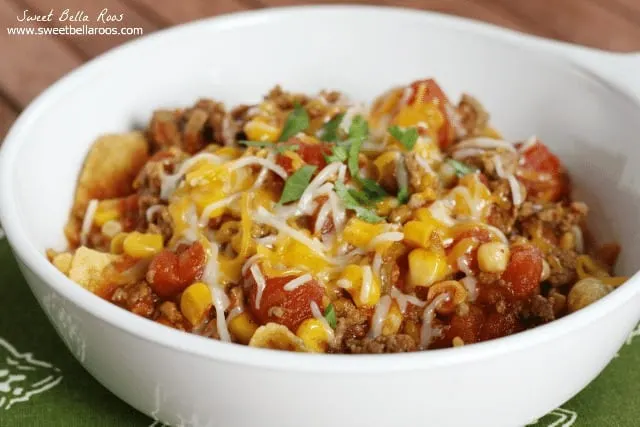 bowl of taco chili topped with cheese 