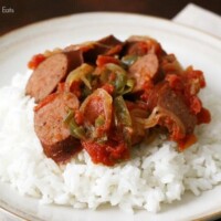 sausage, onions, and peppers over rice