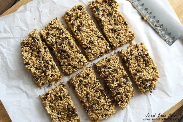 top view of gluten free granola bars , sliced on a cutting board 