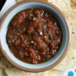 This Restaurant Style Salsa recipe is the best one I've ever made at home. Scoop it up with chips or use it to smother everything from eggs to enchiladas.