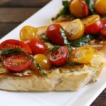 This delicious Garlic Tomato Basil Bruschetta is the perfect summer appetizer or snack.