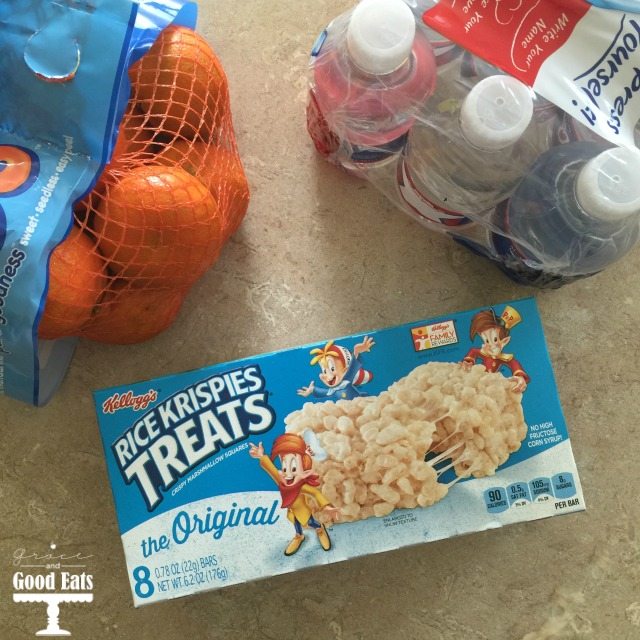 oranges, water, and box of rice krispie treats