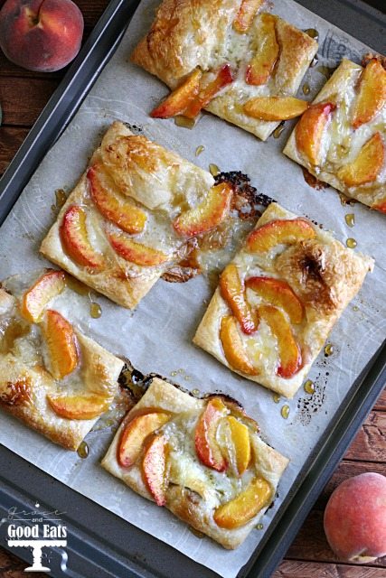 Peaches and Brie Puff Pastry tarts generously topped with brown sugar and honey. Like individual peach pies without all the work!