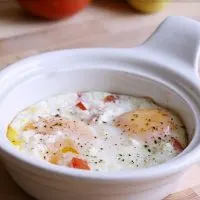 Delicious, creamy baked eggs with ripe tomatoes and flavorful feta cheese.  A must-make dish for breakfast or dinner!