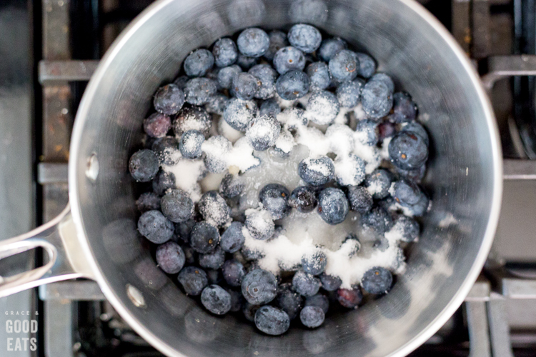 blueberries in a sauce pan with sugar