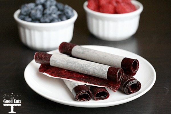 homemade fruit leathers rolled up on a plate