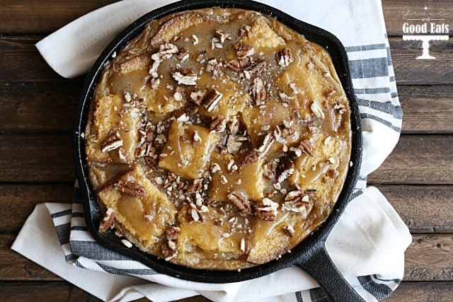 overhead view of cornbread pudding in a cast iron skillet 