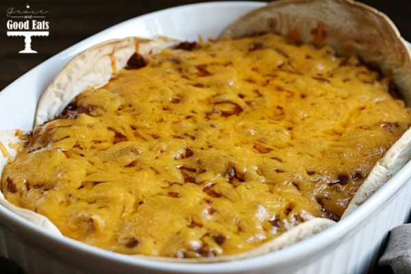 baked mexican meatloaf in a white casserole dish