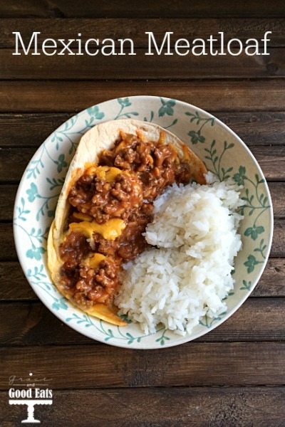 portion of mexican meatloaf with white rice in a floral bowl 