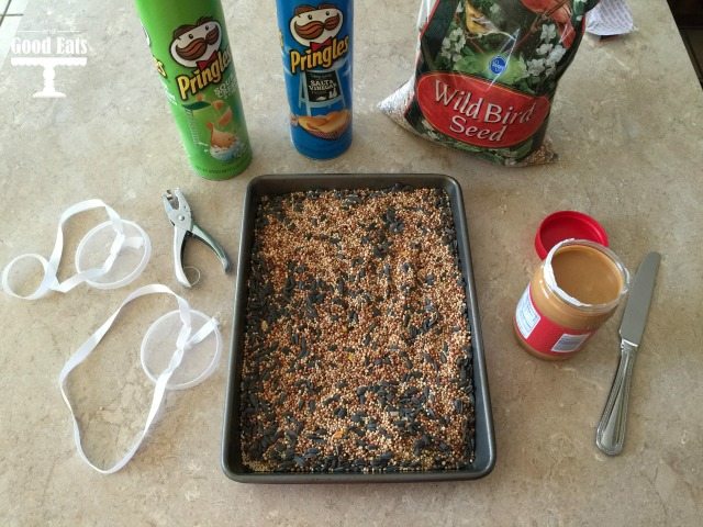 baking sheet filled with bird seed