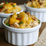 Loaded Baked Potato Casserole- serve in individual ramekins or as a big casserole. Full of chicken, potatoes, cheese, and bacon!