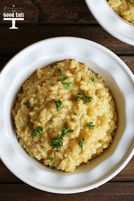 creamy Parmesan risotto topped with parsley in a bowl