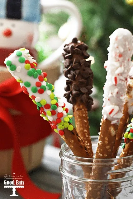 Christmas chocolate covered pretzels in a glass jar. 
