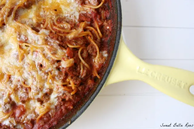 top view of baked spaghetti casserole in a skillet 