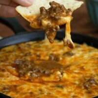 This Beef Enchilada Dip is a super easy and delicious appetizer. Perfect for game day parties or get-togethers.