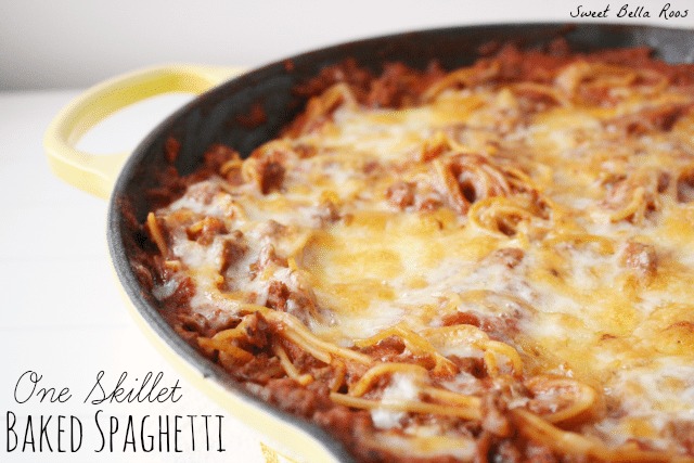 Skillet spaghetti in a yellow cast iron skillet. 