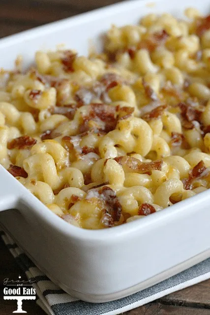 bacon mac and cheese in a white casserole dish