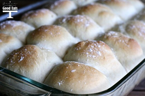 homemade yeast rolls in a glass baking dish. 