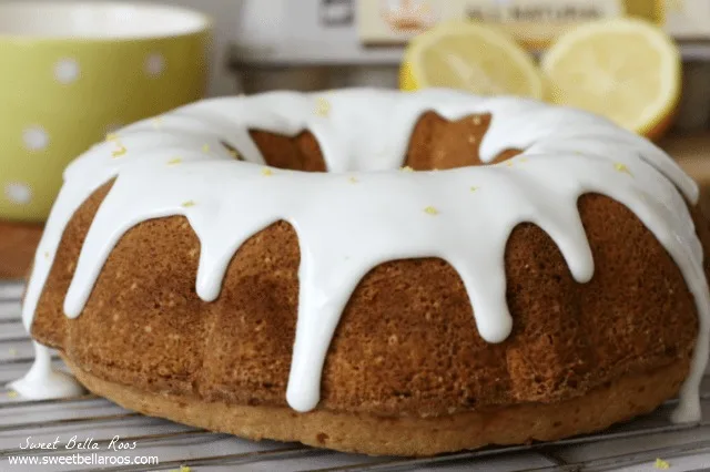 lemon bundt cake with thick lemon glaze on wire rack