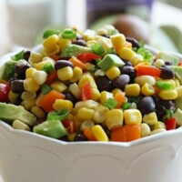 This Spicy Black Bean Corn Salad is a perfect side for a Tex-Mex meal, or a delicious dip as a pre-dinner or party appetizer. Serve it with your favorite tortilla chips and you have a fresh dish that's packed with flavor.