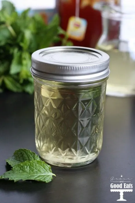 small mason jar with lid of mint simple syrup