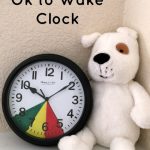 Help your little ones know when it is okay to get out of bed with this easy DIY Toddler Ok to Wake Clock with inexpensive dollar store items!