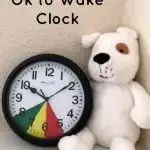 Help your little ones know when it is okay to get out of bed with this easy DIY Toddler Ok to Wake Clock with inexpensive dollar store items!