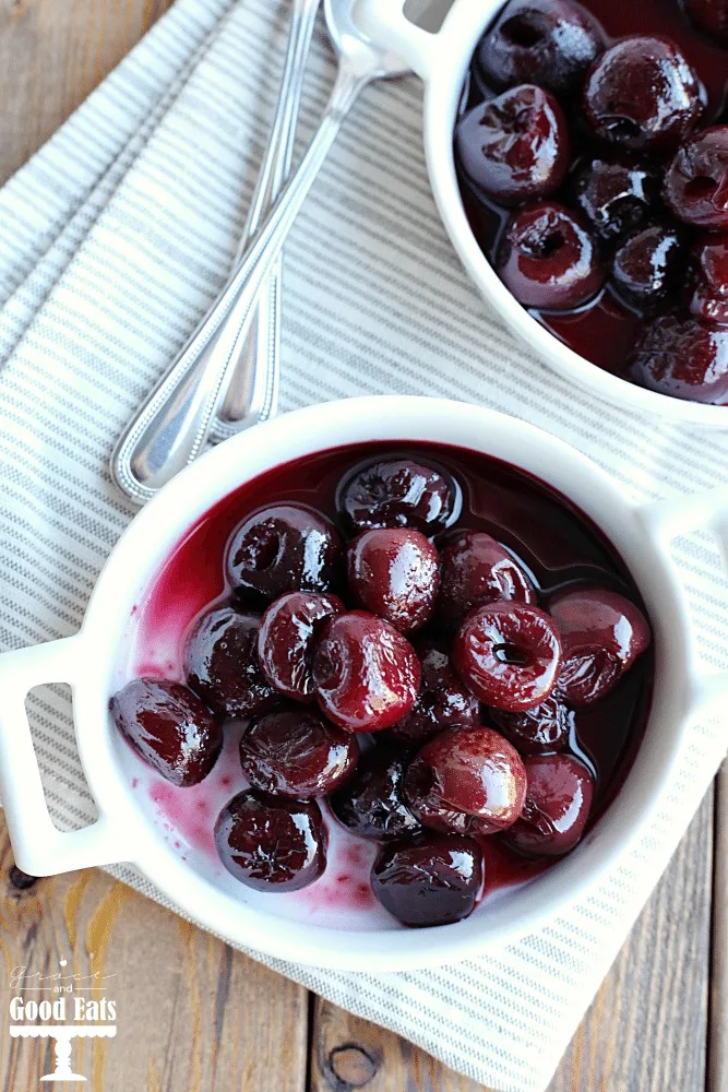 roasted bourbon cherries in a white dish