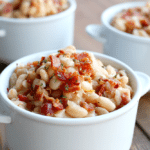 Combine Great Northern Beans with bacon, onions, and spices in the slow cooker for a delicious meal.