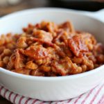 These Bacon Baked Beans are loaded with bacon, so simple to make, and full of sweet, tangy flavor.