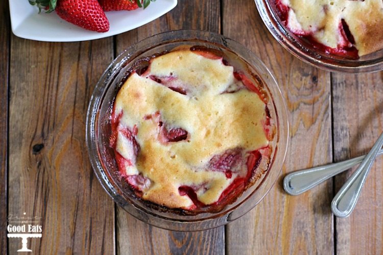 golden brown baked custard with red strawberry fruit filling