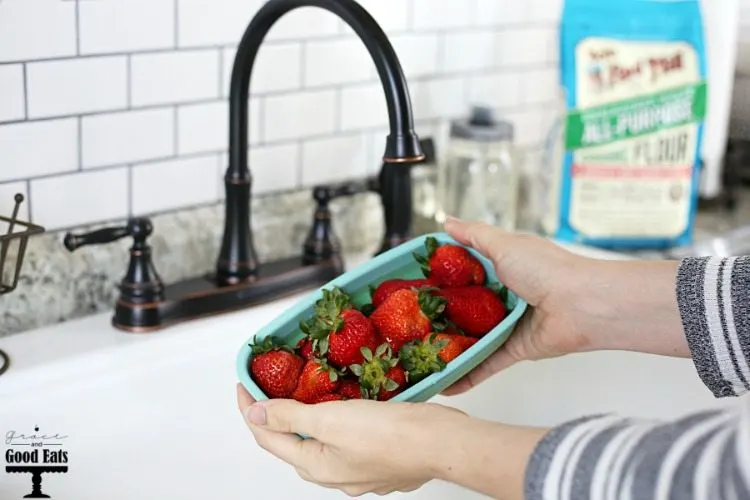 washing strawberries