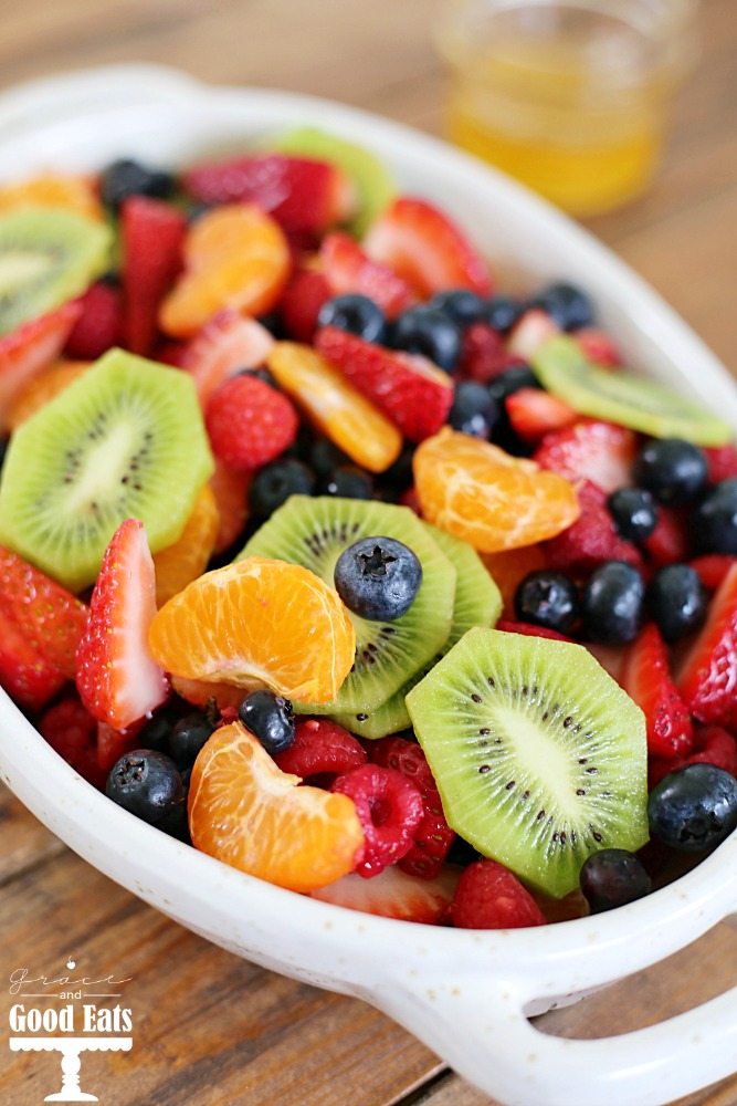 white dish filled with homemade fruit salad