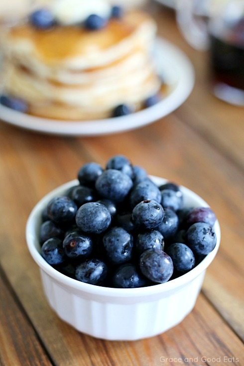 white bowl full of blueberries