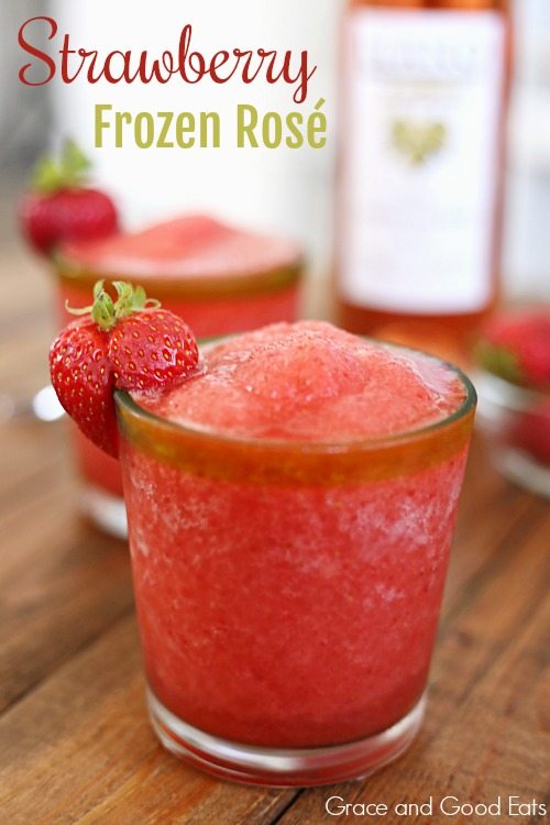 two glasses of frozen rose garnished with fresh strawberries 