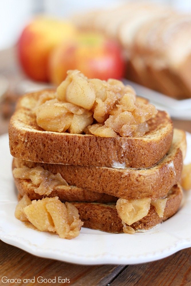 stack of apple french toast on a white plate