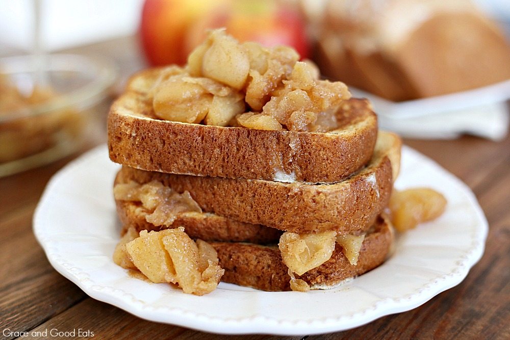 stack of apple french toast on a white plate