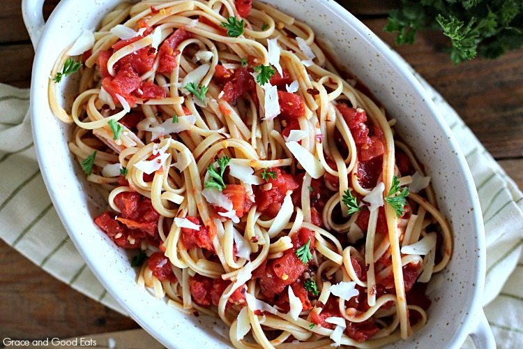 This Arrabbiata, or spicy marinara, combines tomatoes, red chili, garlic, olive oil for a delicious sauce with a kick.  Serve this simple linguine arrabbiata with a loaf of crusty French bread and extra olive oil for dipping!