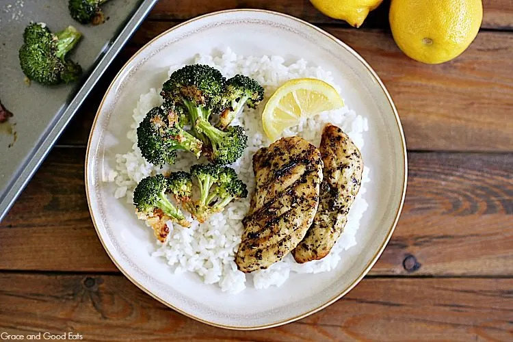 Cooked Perfect Lemon Herb Chicken and Parmesan Roasted Broccoli come together to create a one Sheet Pan Lemon Chicken.  This dish is an easy weeknight meal and bakes in under twenty minutes.