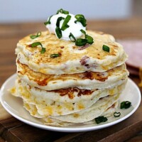 These Savory Ham and Cheese Pancakes are the perfect recipe for leftover holiday ham. They are so easy and delicious that they could easily be the star of your Easter brunch, too!