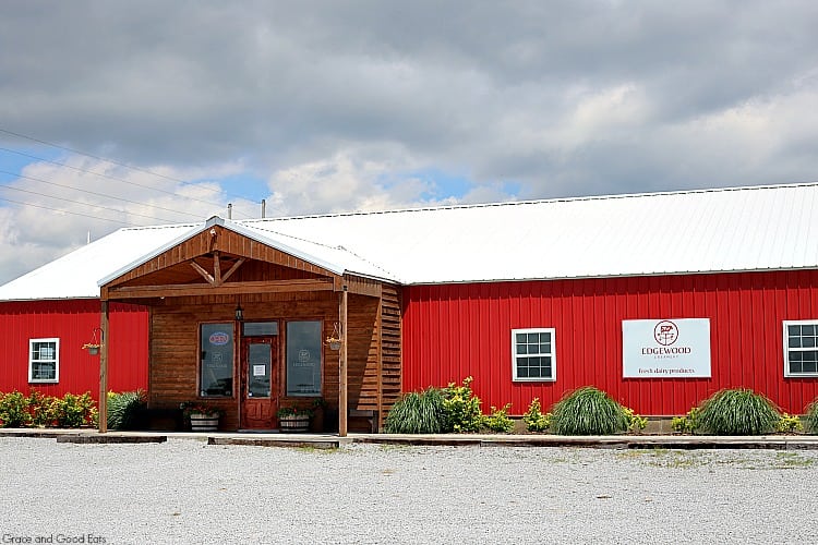 red barn building with a metal roof